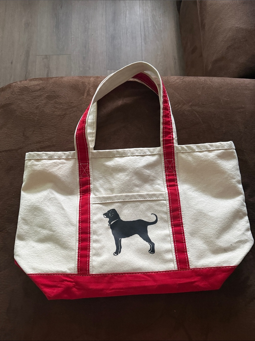 The Black Dog Cream Canvas Tote with Red Trim and Black Dog Graphic